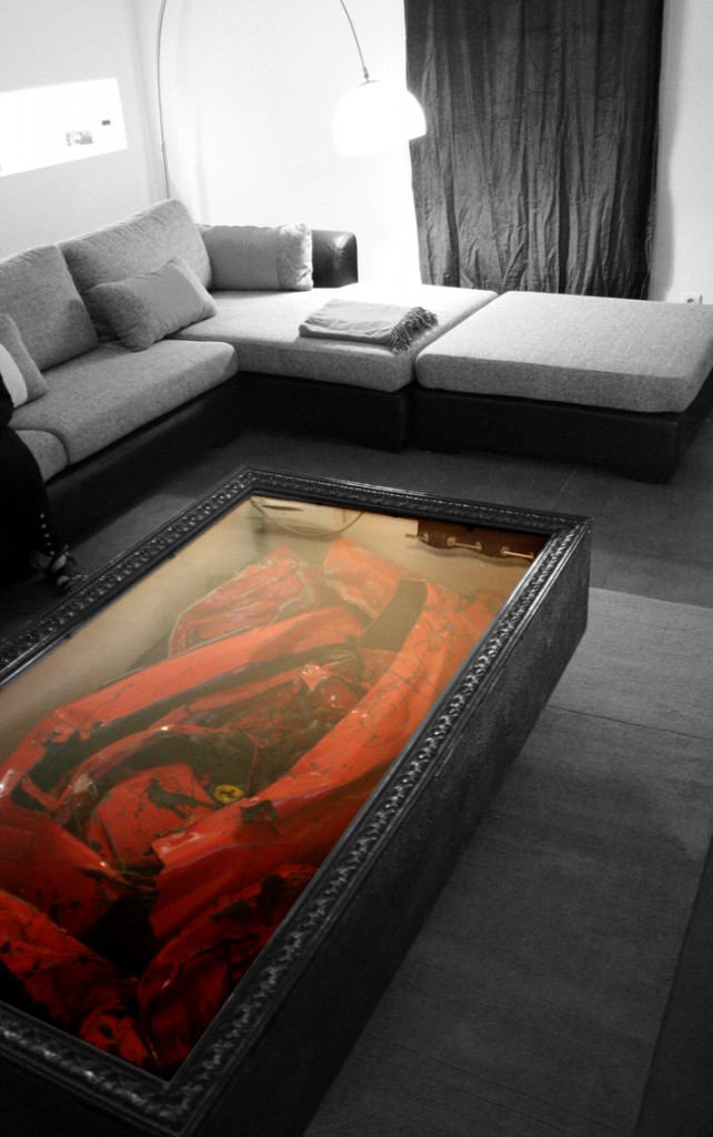 http://www.aljalawi.net/wp-content/uploads/2011/11/Molinelli-Crashed-Ferrari-Table-1-642x1024.jpg